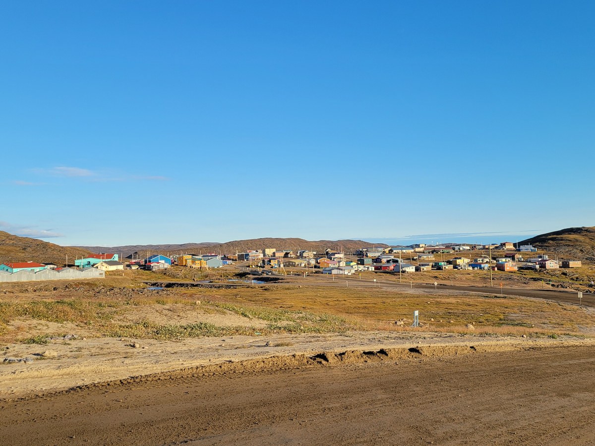 Apex Iqaluit historic Inuit hamlet across Frobisher Bay with HBC heritage buildings