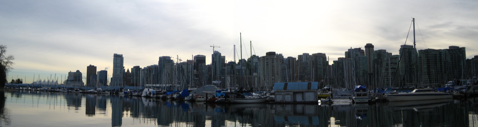 Downtown Vancouver skyline along Burrard Inlet — Coal Harbour and West End core